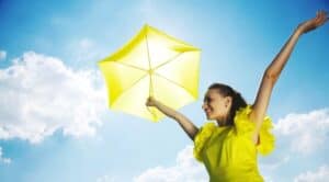 Girl with Umbrella in Sunshine