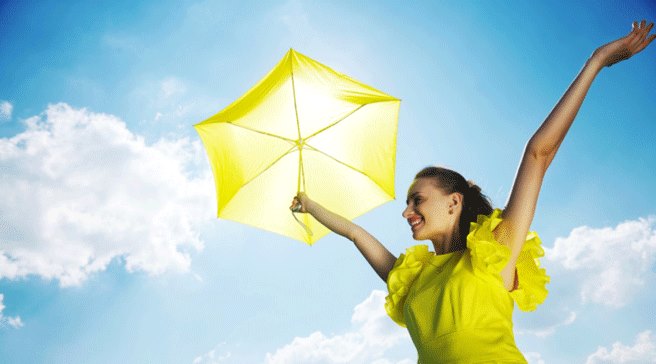 Girl with Umbrella in Sunshine